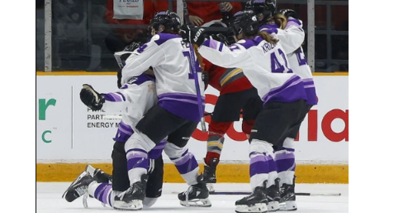 Britta Curl-Salemme, far left, celebrates with Frost teammates after scoring the winning goal against the Charge in overtime