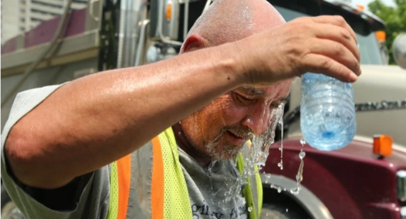 Outdoor workers around the city were wilting under the extreme heat and humidity