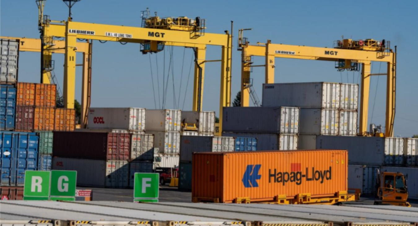 Shipping containers are moved in the Port of Montreal